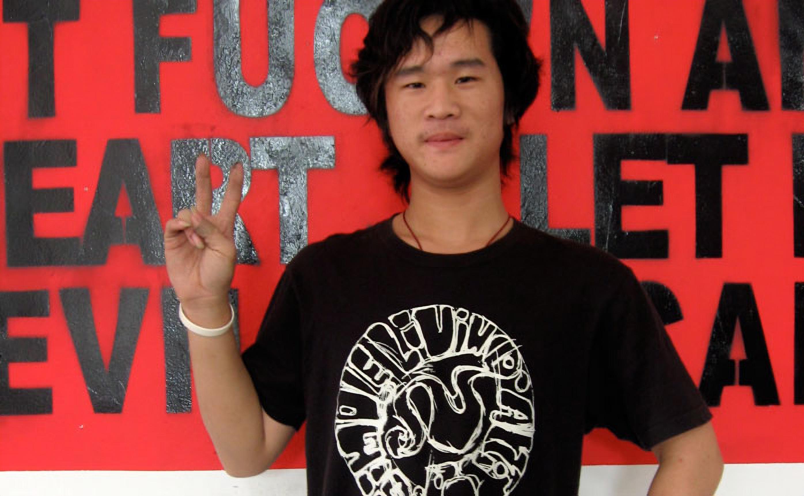 Whatever I Like, technician in Simple Living t-shirt with installation, Pickled Art Centre, Beijing, 2007