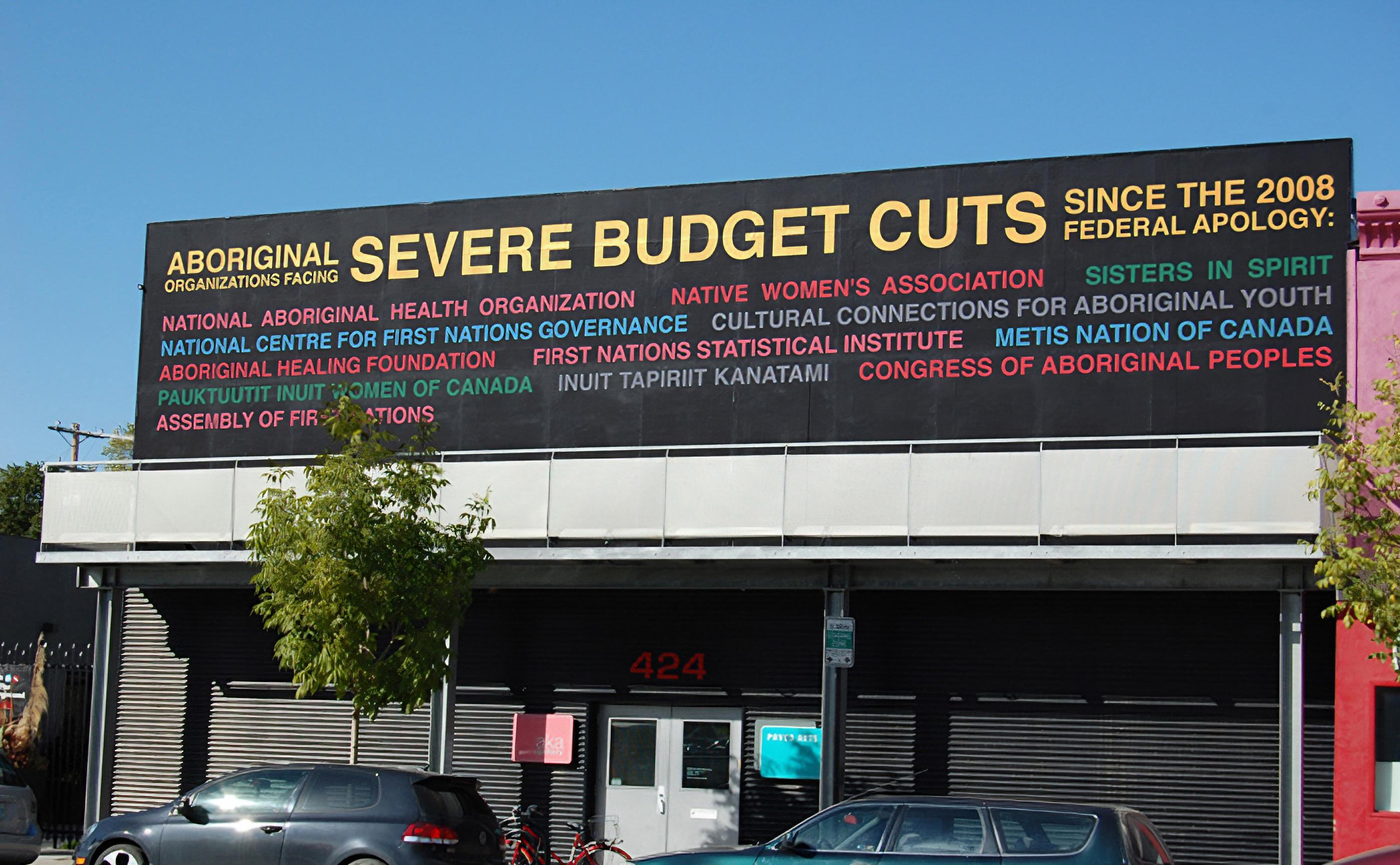 Budget Cuts, billboard, AKA Gallery and Paved Arts, Saskatoon, Saskatchewan, 2012