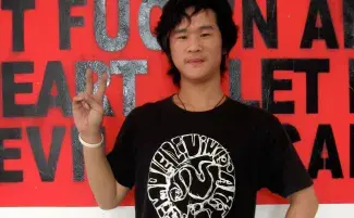 Whatever I Like, technician in Simple Living t-shirt with installation, Pickled Art Centre, Beijing, 2007