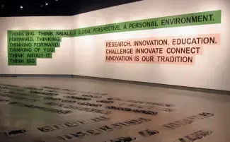 Branded, "Think" and "Innovation", wall-text paintings, Render, University of Waterloo Art Gallery, Canada, 2008. "Think" from top: Albright College, University of Wisconsin-Madison, University of Windsor, Electrolux, UBC, Apple. "Innovation" from top: U PEI, University of Ontario Institute of Technology, UC San Diego.